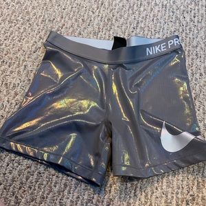 Size large metallic Nike Pros